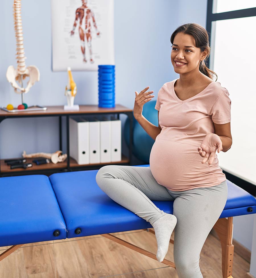 Pregnant Woman on Chiropractic Table